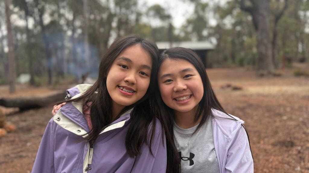 Two girls and best friends during a LifeTrail teen hike at a Bibbulmun Track campsite