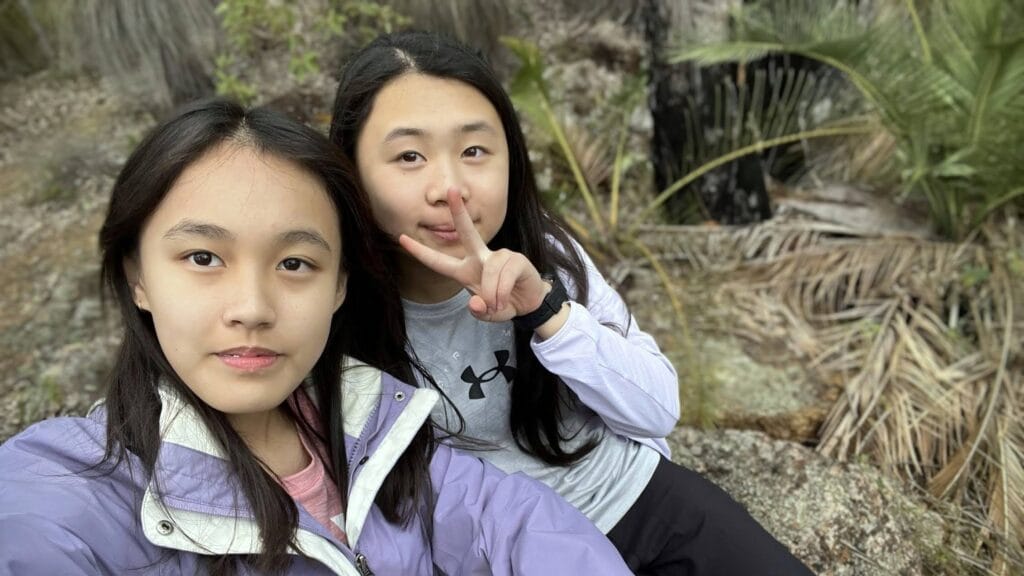 Two girls and best friends taking a selfie during a LifeTrail teen hike on the Bibbulmun Track