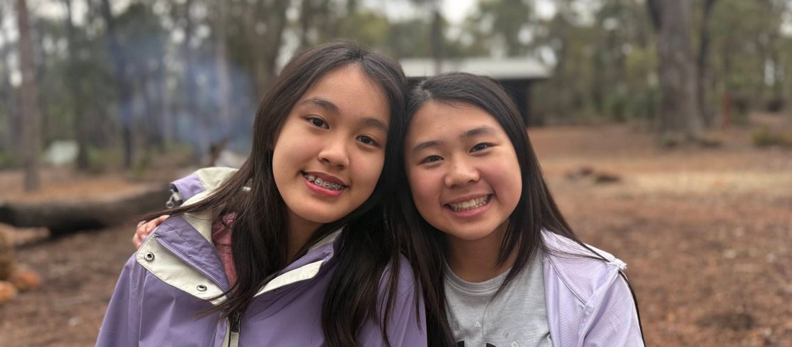 Two girls and best friends during a LifeTrail teen hike at a Bibbulmun Track campsite