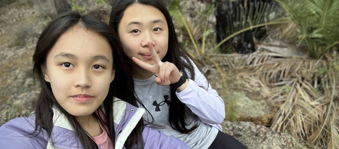 Two girls and best friends taking a selfie during a LifeTrail teen hike on the Bibbulmun Track